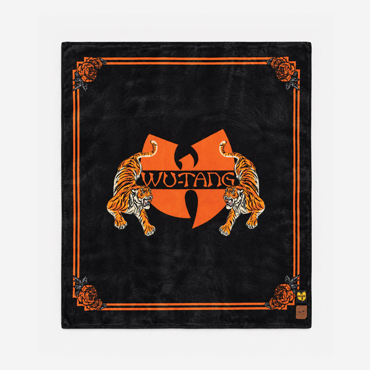 Polar fleece blanket featuring tiger artwork and corner rose motifs.