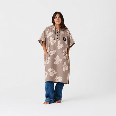 Quick-dry hooded poncho in taupe with white floral print and front button placket.