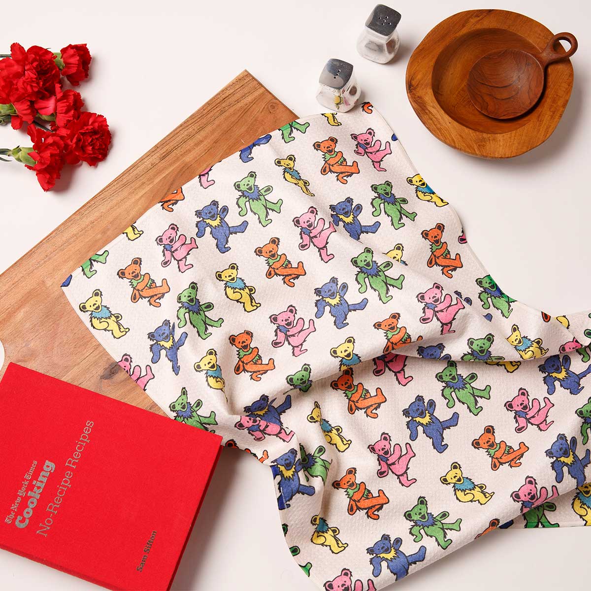 Quick-dry kitchen towel with a colorful dancing bear pattern.