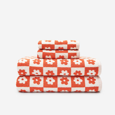 Bath towel set, cotton, red and white floral geometric checkerboard pattern.