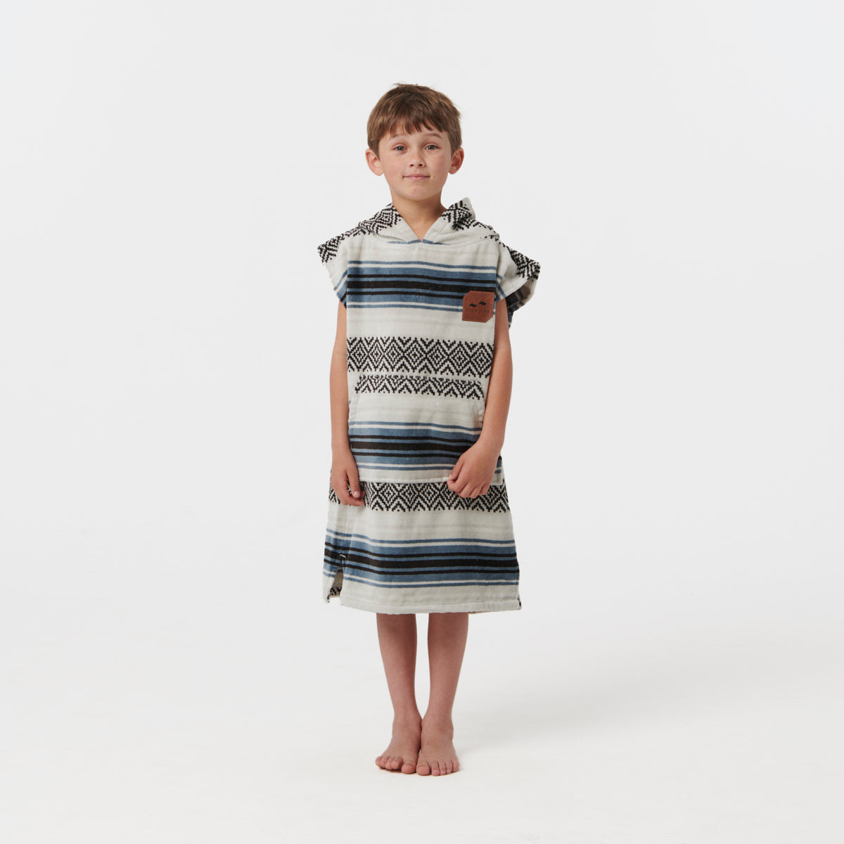 Absorbent changing poncho with leather patch.