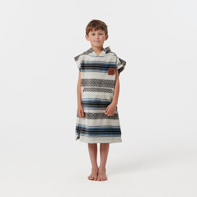 Absorbent changing poncho with leather patch.